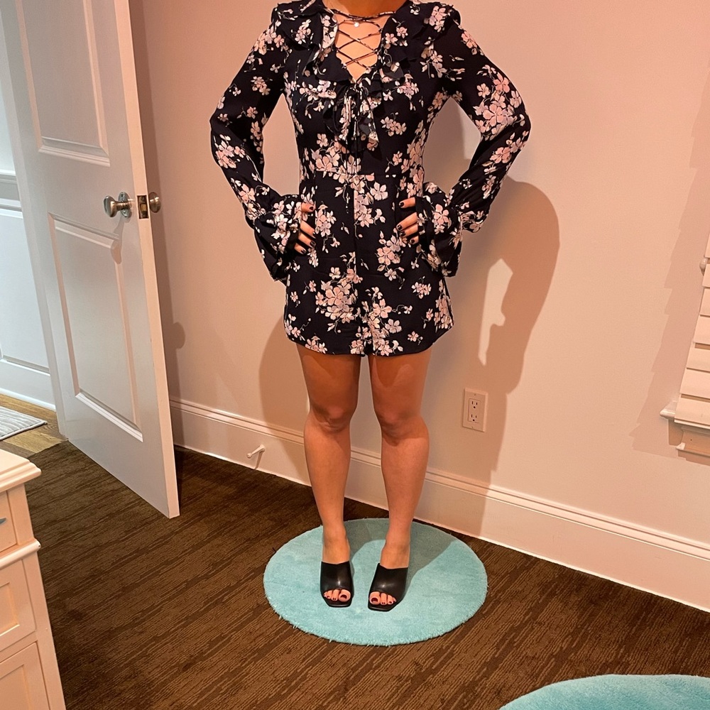 Blue floral long sleeve romper. Perfect for spring!